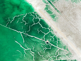 Aerial view of industrial waste pond with beautiful patterns and textures, Huelva, Huelva, Spain.