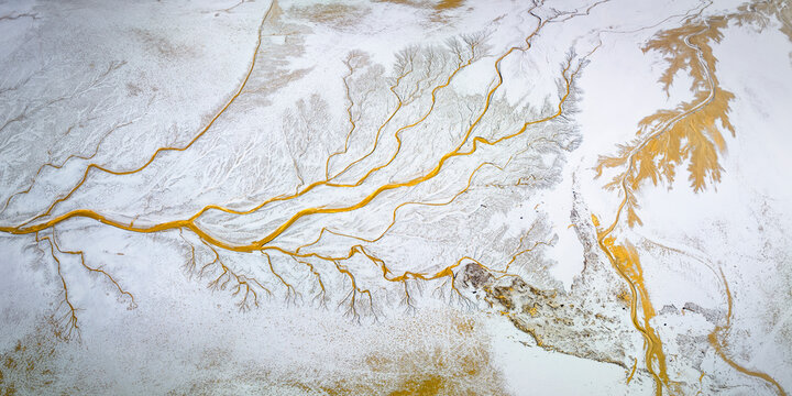 Aerial view of beautiful alluvial fan patterns with serpentine streams and natural textures, Cantil, California, United States.