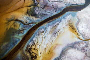 Aerial view of colorful mineral mine with vibrant patterns and textures, Trona, California, United States.