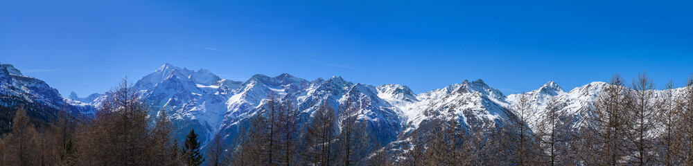 Panorama of Swiss Alps mountain chains with Weissmies, Laggin-, Fletsch-, Balfrin- oder Bietschhorn peaks viewed from Hannigalp, Grachen