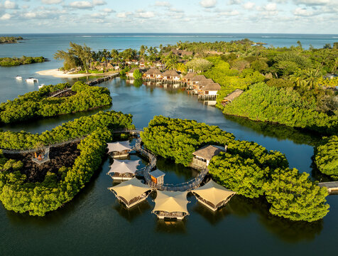 Aerial view of luxury resort by the beautiful white sand beach and clear blue ocean, Prince Maurice, Flacq, Mauritius.