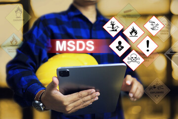 Safety staff holding tablet with material safety data icon MSDS, indicating prepare in emergency...