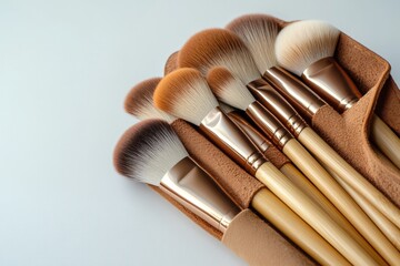 Elegant arrangement of makeup brushes showcasing diverse shapes