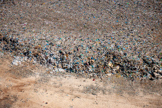 Aerial view of a polluted landfill site filled with garbage and industrial waste, Pula, Istria, Croatia.