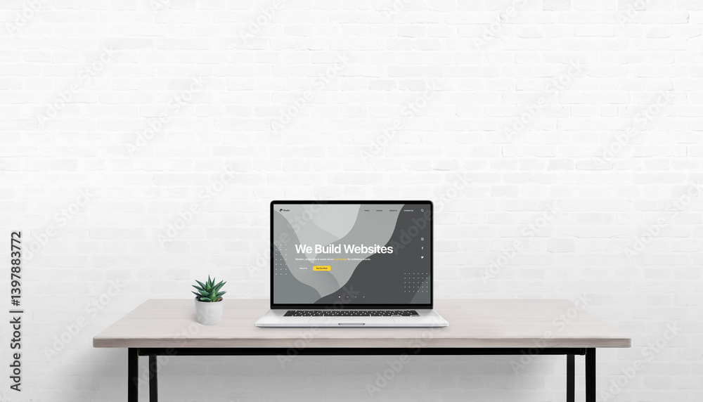 Poster Generated Simple work desk with laptop and plant, conceptual web design displayed on screen, white brick wall in background with empty space for promotional copyimage