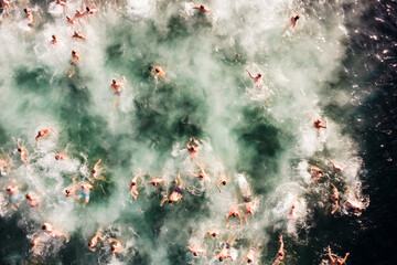 Aerial view of people swimming in cold water during the Epiphany Christian holiday, Varna, Varna, Bulgaria.