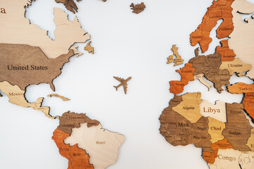 Detailed wooden world map puzzle with engraved country names, perfect for travel enthusiasts and geography lovers