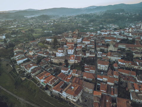 Aerial view of catedral de santa maria de tui in the historic old town with scenic rooftops and medieval buildings, Tui, Pontevedra, Spain.