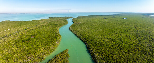 Aerial view of blackwater sound with lush greenery and tranquil waterway, Jewfish, Florida, United States.