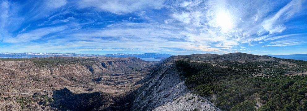 Aerial view of beautiful Baska valley with majestic mountains under a clear sky, Baska, Primorje-Gorski Kotar, Croatia.