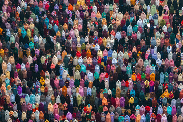 Bogura, Bangladesh - 11 April 2024: Aerial view of women participating in vibrant eid prayer gathering, Bogura, Rajshahi, Bangladesh.
