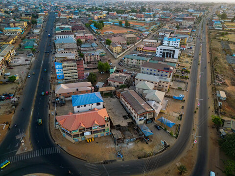 Aerial view of urban cityscape with busy streets and modern buildings at the intersection of Ahmadu Bello Way and Independence Way, Kaduna North, Kaduna, Nigeria.
