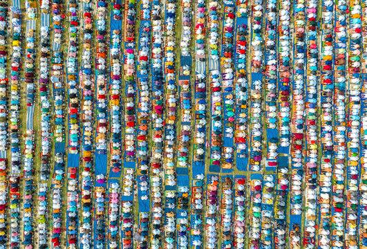 Aerial view of colorful eid prayer gathering with diverse congregation and tents, Bogura, Rajshahi, Bangladesh.