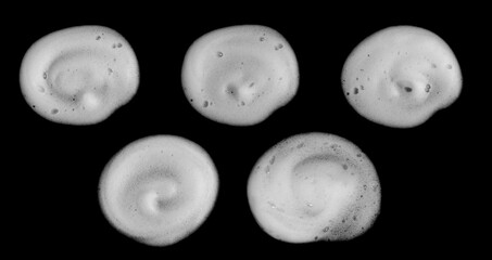 Skin care products facial foam, soap, shampoo or shower gel, abstract soap bubbles, isolated on black background 