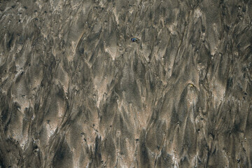 Abstract background pattern of the sand on a tropical beach