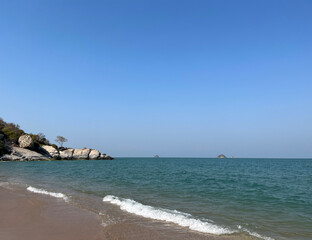Tropical beach and sea in sunny day
