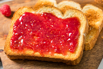 Sweet Homemade Raspberry Jam Jelly on Toast