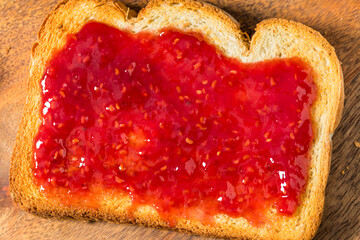 Sweet Homemade Raspberry Jam Jelly on Toast