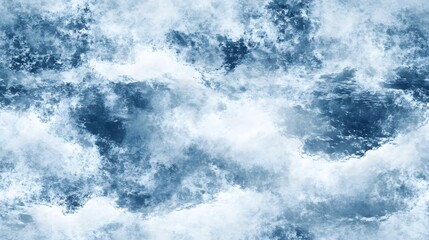 Fototapeta premium Abstract textured background of muted blues and whites.