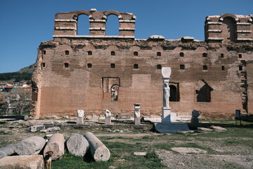 red basilica or red hall is a monumental ruined temple in the city of Pergamon . Temple was built during roman empire in the time of Hadrian unesco world heritage