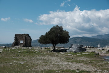 Pergamon is an ancient ruined greek city located aegean region in Turkey temples, gymnasium, stoa, atlar of zeus in sloping terrain surrounded by city wall