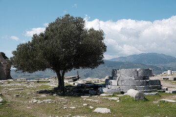 Pergamon is an ancient ruined greek city located aegean region in Turkey temples, gymnasium, stoa, atlar of zeus in sloping terrain surrounded by city wall