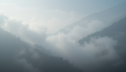 Misty mountain landscape serene nature scene atmospheric photography majestic peaks soft fog tranquil environment aerial view captivating vistas for travel inspiration