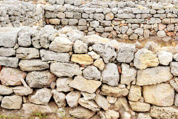 The ruins of an ancient building for preservation are sheltered by a special canopy