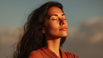 Fototapeta premium Studio portrait of a serene woman meditating with her eyes closed, radiating calmness and inner peace. Perfect for wellness, mindfulness, yoga, and relaxation-themed content.
