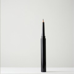 Naklejka premium Elegant Black Eyeliner Pencil Standing Tall Against a Clean, Minimalist Backdrop Showcasing Precision and Definition for the Perfect Look.