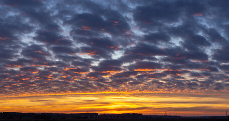 Bright colorful sunset, bright light on the horizon