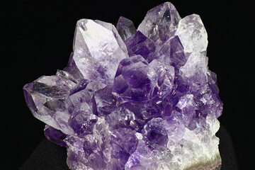 Bright beautiful amethyst druse on a dark background