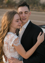Bride and groom sharing a peaceful embrace after the ceremony. Emotional connection, tenderness and the quiet beauty of wedding day intimacy.