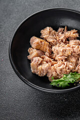 Tuna canned fish seafood appetizer dish organic product fresh tasty gourmet food background on the table rustic food top view copy space keto and paleo pescetarian diet