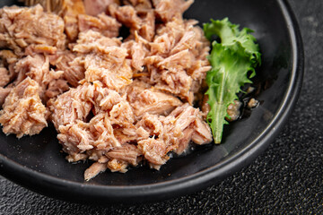 Tuna canned fish seafood appetizer dish organic product fresh tasty gourmet food background on the table rustic food top view copy space keto and paleo pescetarian diet