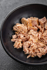 Tuna canned fish seafood appetizer dish organic product fresh tasty gourmet food background on the table rustic food top view copy space keto and paleo pescetarian diet