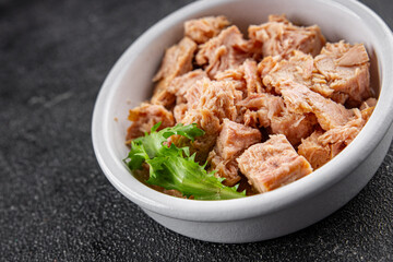 Tuna canned fish seafood appetizer dish organic product fresh tasty gourmet food background on the table rustic food top view copy space keto and paleo pescetarian diet