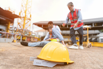 Men, construction, architect have accident during construction on site. Construction builder worker...