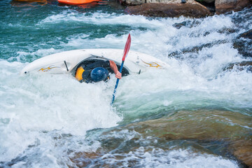 Kayaking down the Uncompahgre River in the Ridgeway, Colorado.