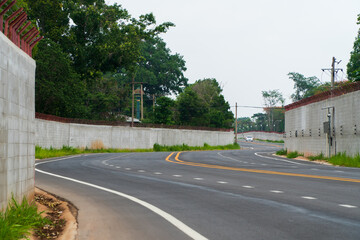 Fototapeta premium The road is paved with winding curves.