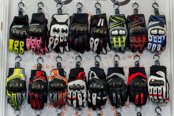 motorcycle gloves in the store. gloves for a person riding a scooter