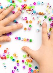 Child cubes and the word mother. Selective focus.