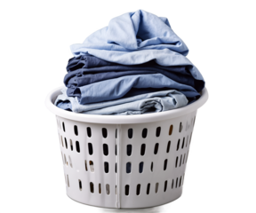 Overflowing laundry basket filled with a variety of pastel blue linens creates a sense of domesticity and coziness that will brighten your visuals and add a touch of serenity