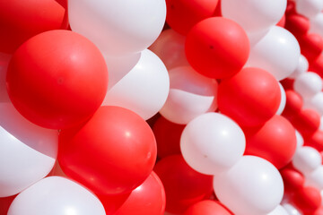 Decoration with balloons in white and red colors. A garland of balloons. © Studio Peace