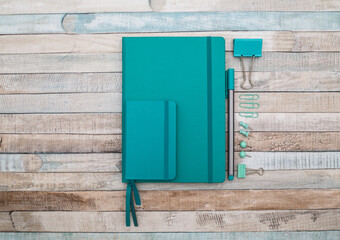 Notepad with pen and paper clips