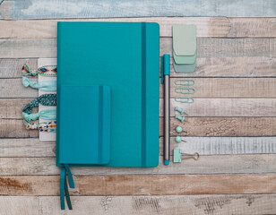 Notepad with pen and paper clips