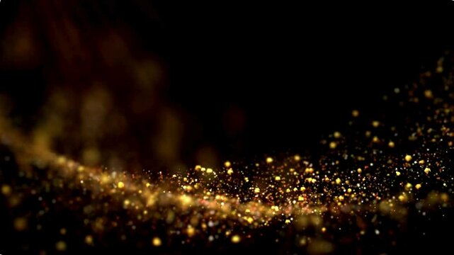 Abstract golden dynamic cloud of dust particles dispersing against black background in explosion