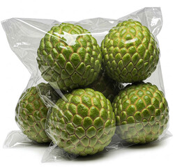 Obraz premium Fresh Sugar Apple,custard apple or Annona packed in a clear transparent bag for easy storage and to preserve original taste. Source of vitamins and minerals, including Vitamin C, and potassium.