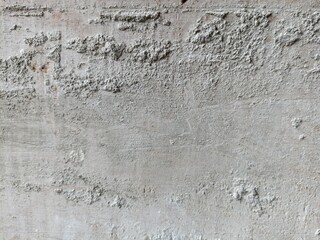 Rough Concrete Wall Surface Texture. Close-up of unfinished concrete wall with rough, gritty surface texture. Ideal for use in backgrounds, 3D mapping, or industrial design projects
