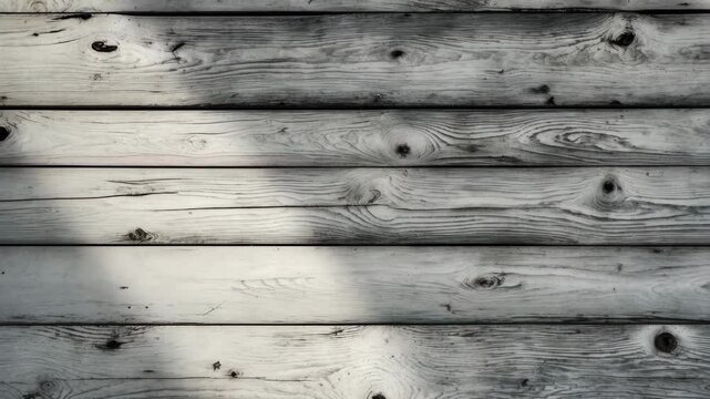Aged pine wood with a vintage white texture backdrop. Distressed grayscale wooden surface. Top view of wood tabletop texture background.